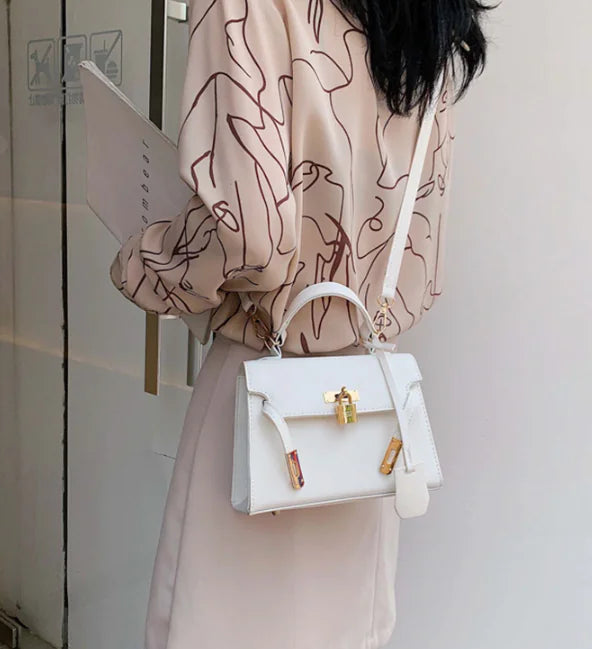 Moderne skuldertaske i platin