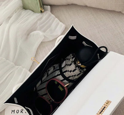 Moderne skuldertaske i platin