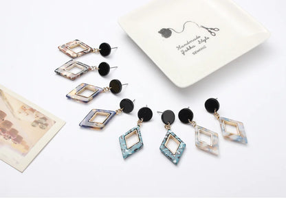 Moderigtige diamantformede øreringe