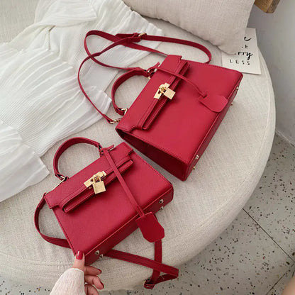 Moderne skuldertaske i platin